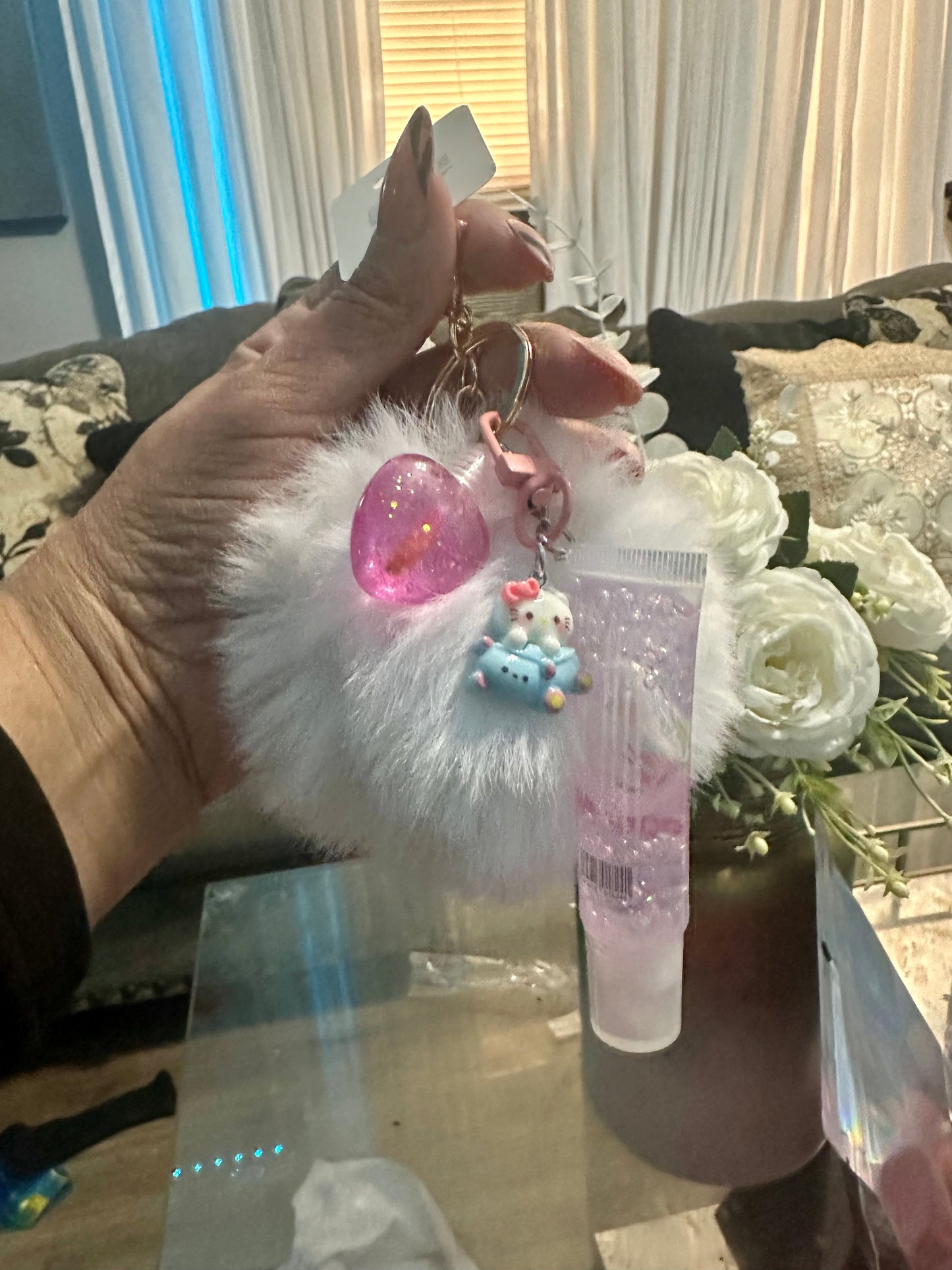 Pompom keychain with lip gloss